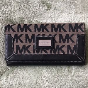 Black and brown Michael Kors wallet